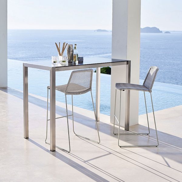 Breeze modern bar stool is a contemporary outdoor bar chair in luxury quality garden furniture materials by Cane-Line modern garden furniture company