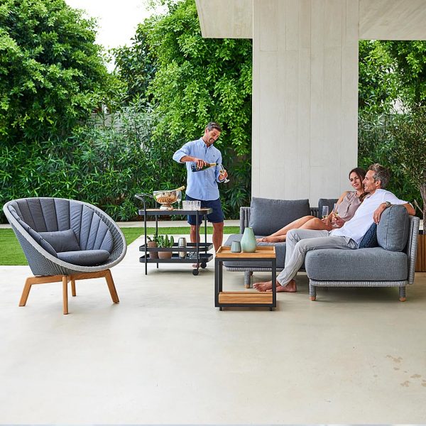 Moments modern garden sofas is a luxury outdoor lounge set in high quality garden furniture materials by Cane-line all-weather outdoor furniture