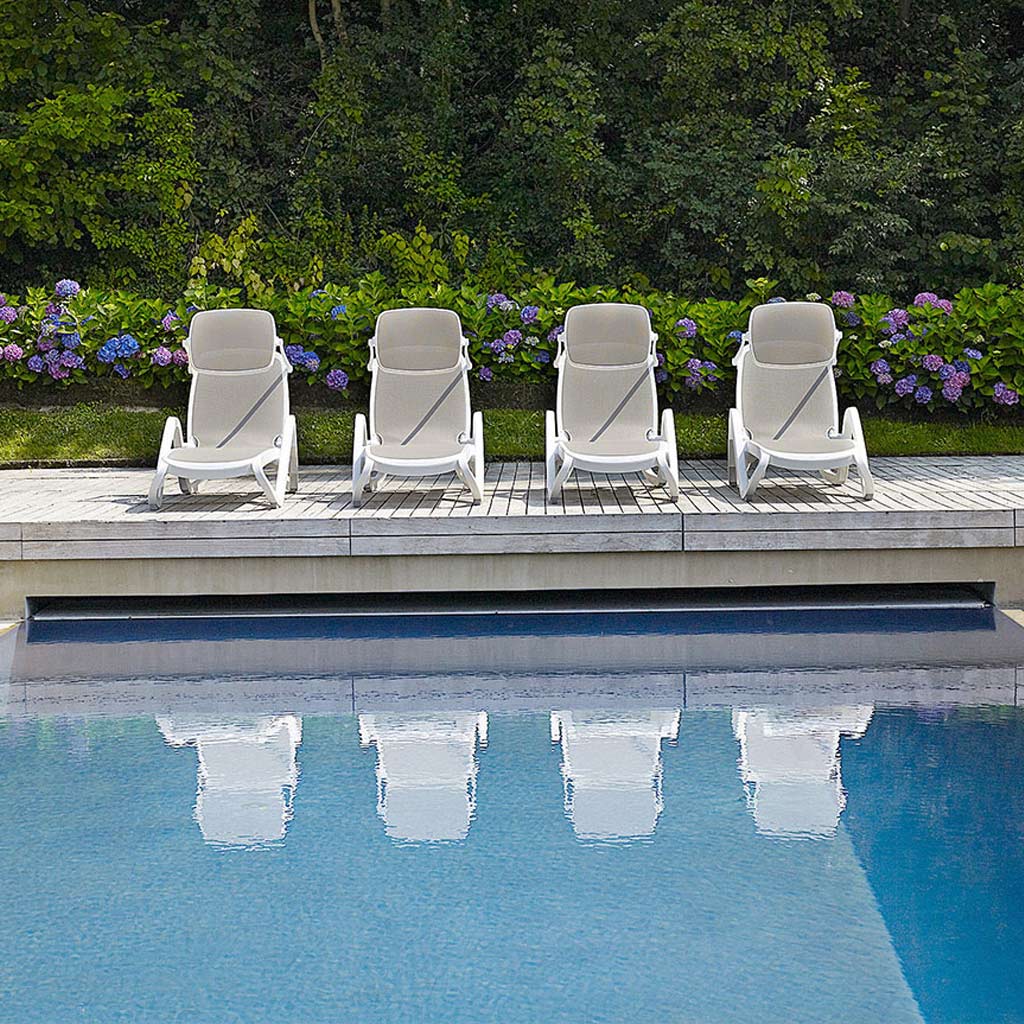 Row Of White Alpha HOTEL SUN LOUNGER Is A STACKING Contract Sunbed In HIGH QUALITY Outdoor Furniture MATERIALS By Nardi MODERN Hospitality FURNITURE - Italy.