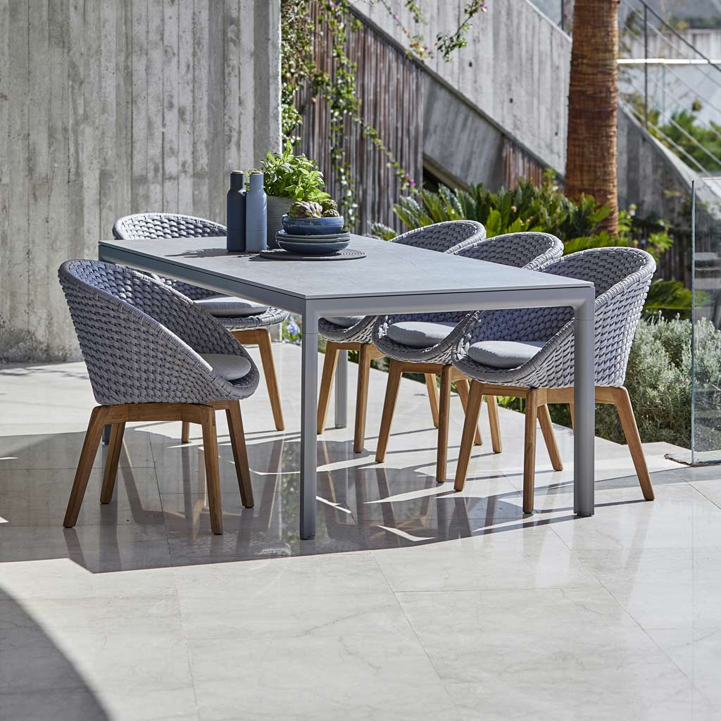 Drop Modern Outdoor Table Is A Simple Garden Table Available As Rectangular Tables, Extending Tables, Bar And Bistro Tables - Made In High Quality Outdoor Furniture By Cane-line All-Weather Furniture- Drop Table & PEACOCK Woven Garden DINING CHAIR. MODERN Garden Furniture Chair In ALL-WEATHER Furniture MATERIALS By CANE-LINE LUXURY Outdoor FURNITURE.