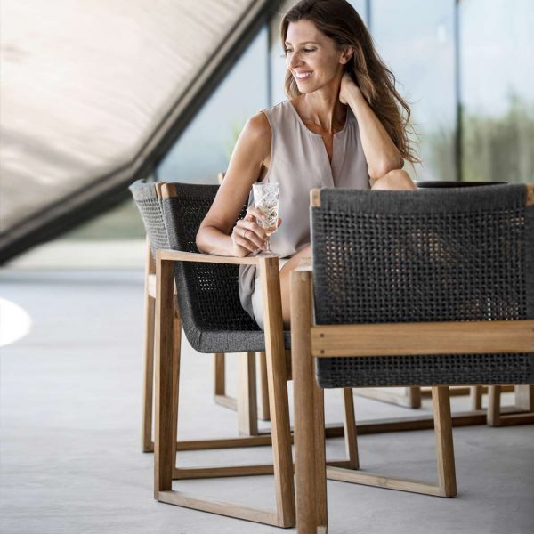 Endless outdoor lounge armchair is a modern garden relax chair in high quality outdoor furniture materials by Cane-line luxury exterior furniture