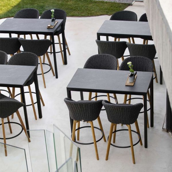 Peacock modern garden stool is a luxury outdoor bar chair in high quality exterior furniture materials by Cane-line garden furniture