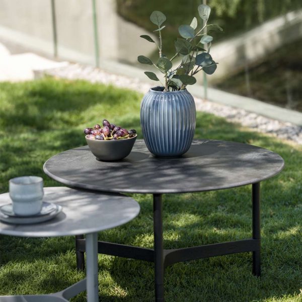 Twist modern garden coffee table is a luxury exterior low table in premium quality outdoor furniture materials by Cane-line garden furniture