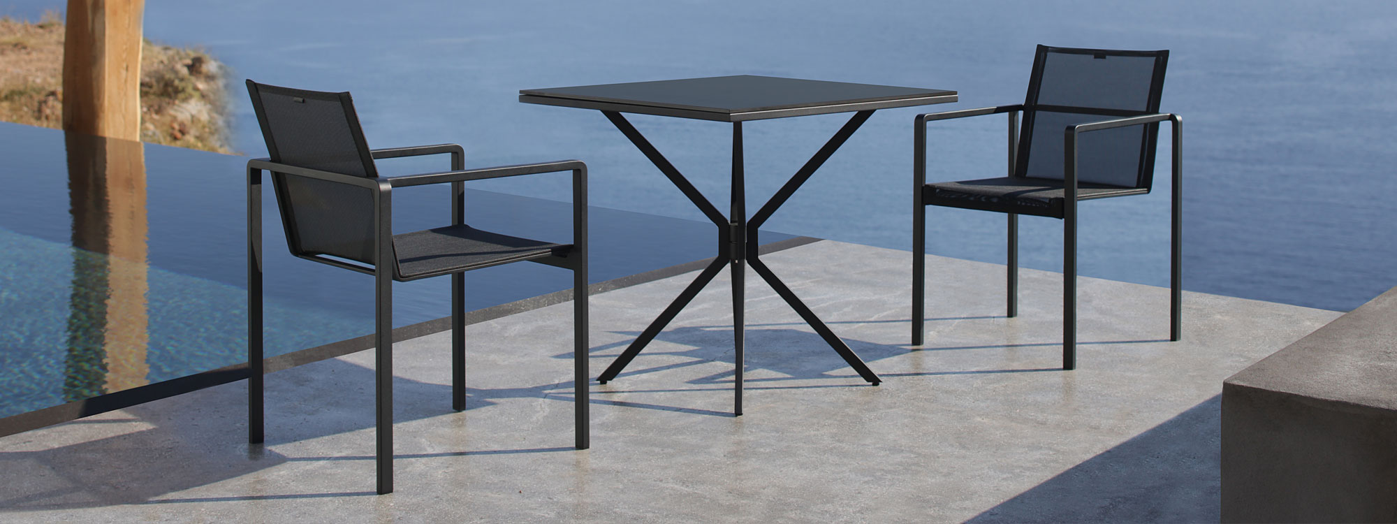 Alura chair & Traverse folding garden table is a versatile modern outdoor table in quality fold-down garden table materials by Royal Botania garden furniture