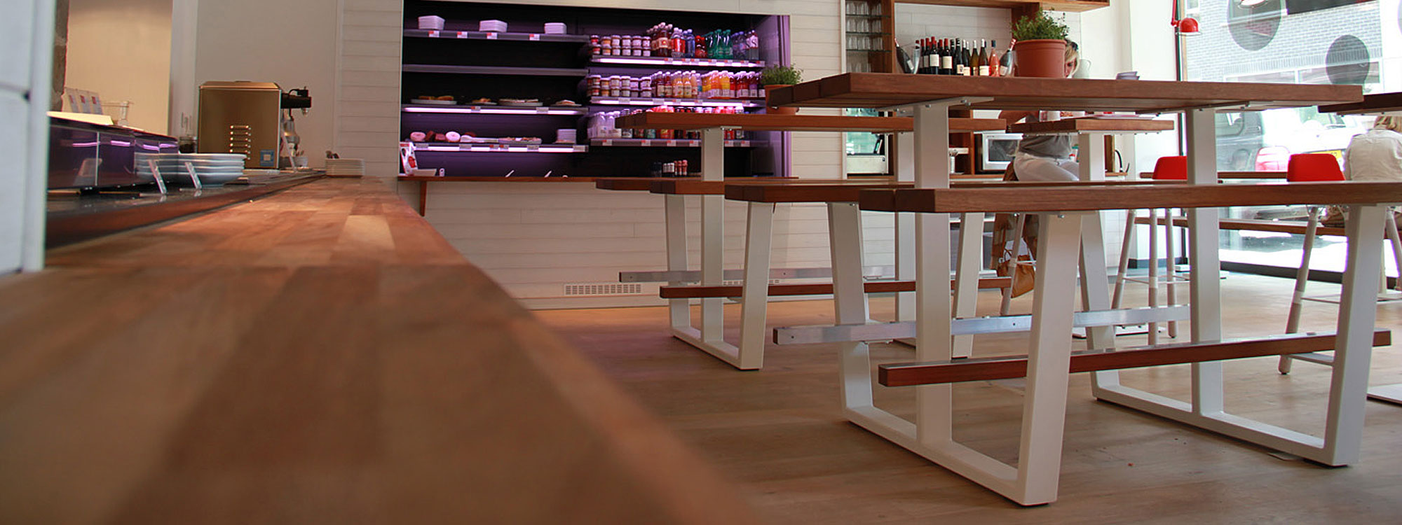 Interior Shot In Bar Of Cassecroute BEER TABLE Is A HIGH Bar TABLE And BENCHES In ALL WEATHER Picnic FURNITURE Materials. Residential & Hospitality MODERN Picnic Tables.