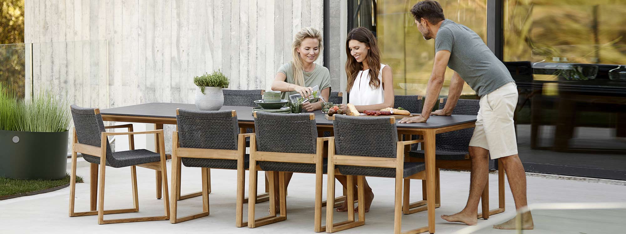 Endless garden carver chair is a modern outdoor dining chair in luxury quality outdoor materials by Cane-line garden furniture company.