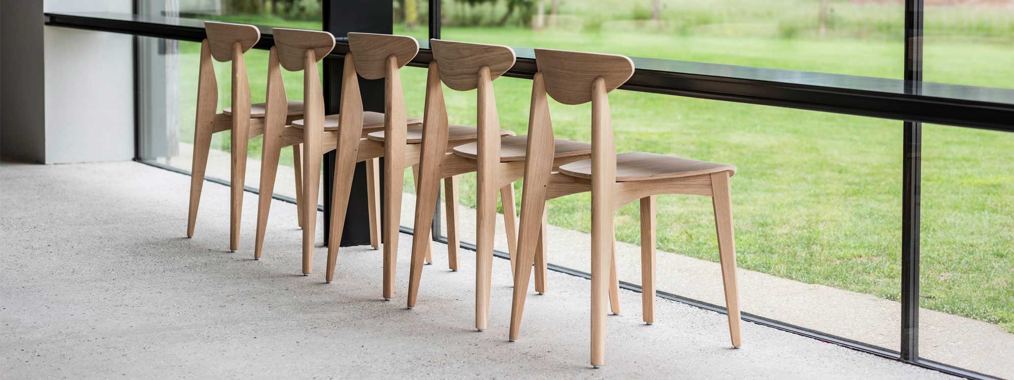 Ink modern chair is a solid oak dining chair by Sergio Herman, made in highest quality furniture materials for WildSpirit designer furniture.