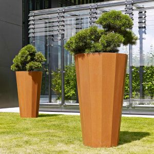 Iris large vertical planter is a tall dodecagonal planter (12 sided) in quality contract planter materials by Flora modern plant pot company.