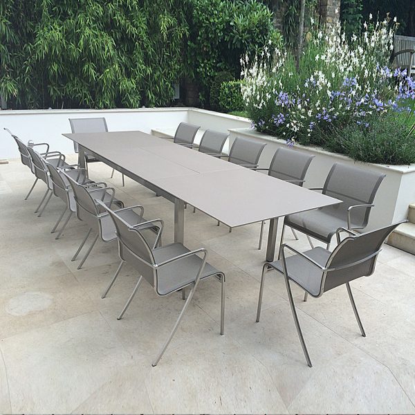 UK installation of Taboela garden table and QT55 chairs in Sand finish