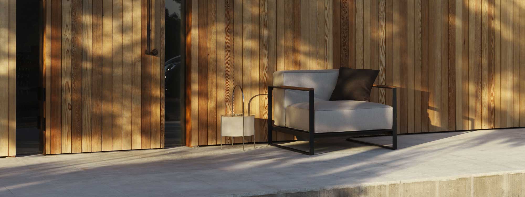 Moore modern garden sofa is a minimalist outdoor sofa in luxury quality garden furniture materials by Roshults designer exterior furniture