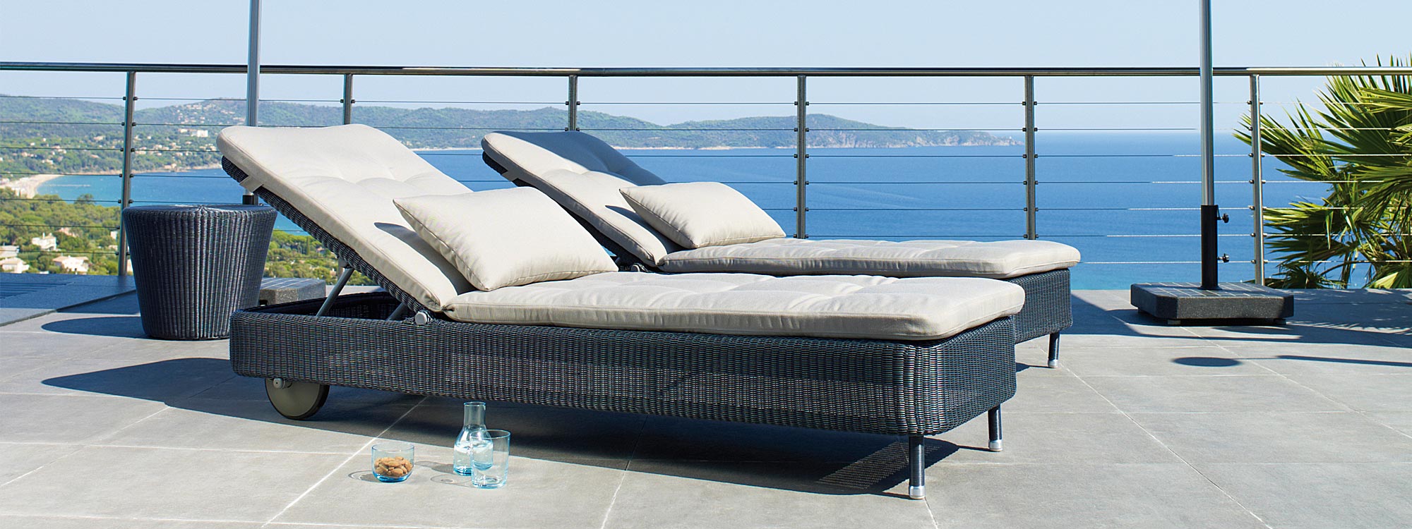 Presley all-weather rattan sun lounger is a fully adjustable classic woven sunbed by Cane-line luxury rattan outdoor furniture company.