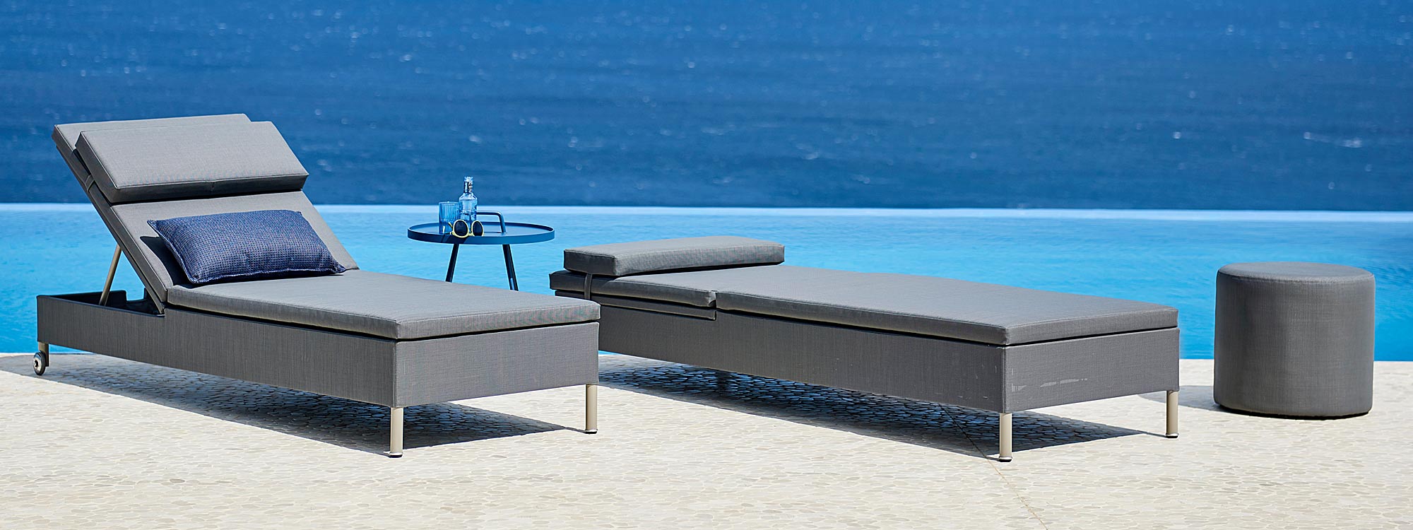 Rest contemporary sunbed is single or twin sun lounger in high quality sun lounger materials by Cane-line garden furniture company.