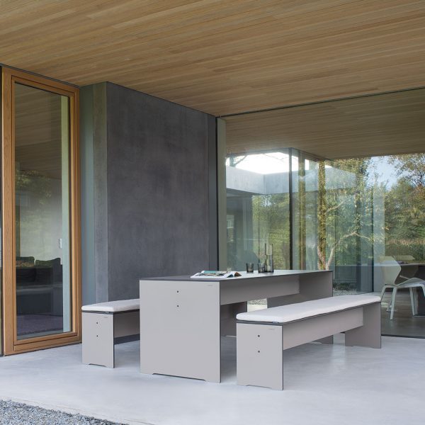 Taupe Riva exterior dining table and outdoor benches on terrace